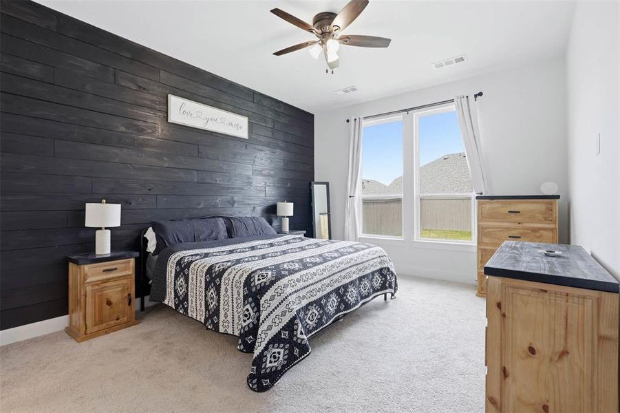 Accent wall featuring dark wood-finish paneling