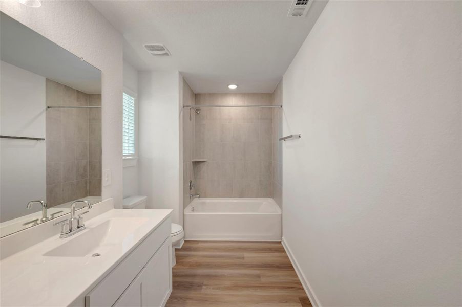 Furnished interior view inside a new home in Wildrye, Waller (Image 12).