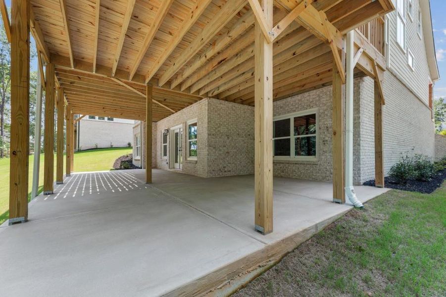 Exterior details and patio area of a home in Arden on Lanier, Cumming (Image 27).