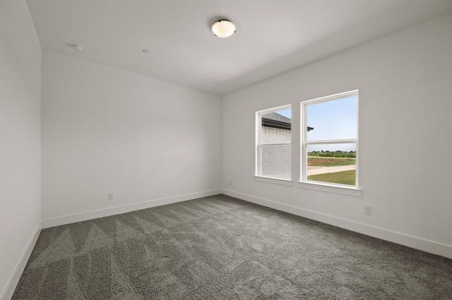 Our Bella plan offers a spacious secondary bedroom complete with en suite bath!