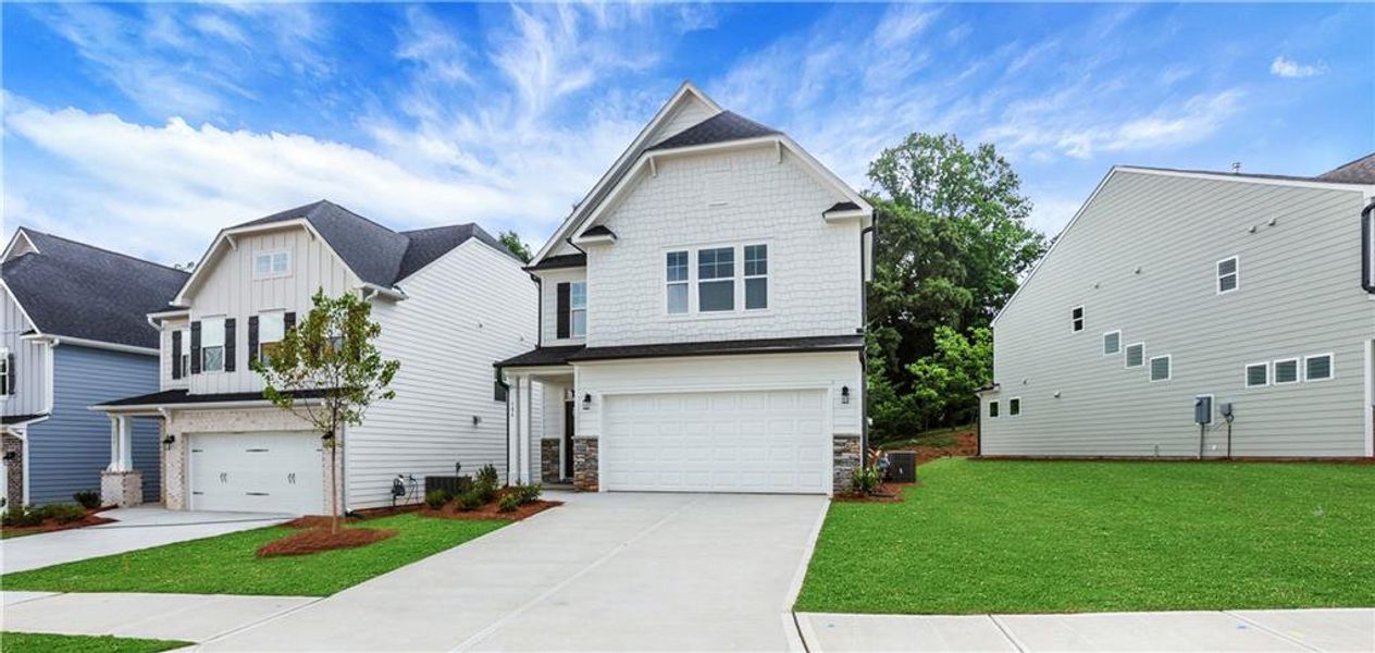 Front exterior of a new home in Villas at Dawsonville, Dawsonville, GA, highlighting curb appeal (Image 24).