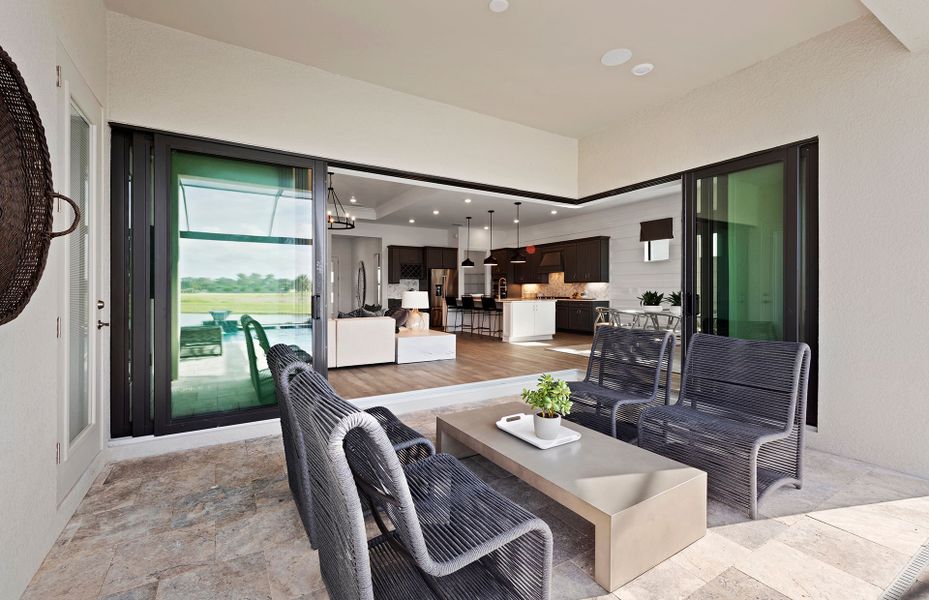 Exterior details and patio area of a home in Talon Preserve on Palmer Ranch, Nokomis (Image 3).