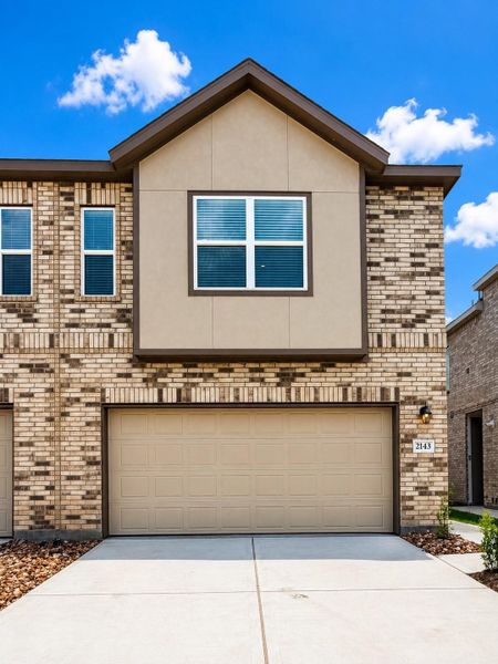 Front exterior of a new home in Sierra Vista, Rosharon, TX, highlighting curb appeal (Image 13).