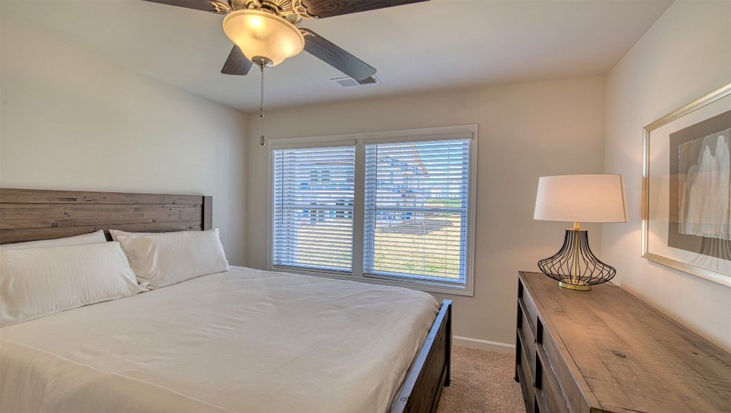 Furnished interior view inside a new home in Townes at Tap Root Farms, Fletcher (Image 24). Furnished interior view inside a new home in Townes at Tap Root Farms, Fletcher (Image 24).