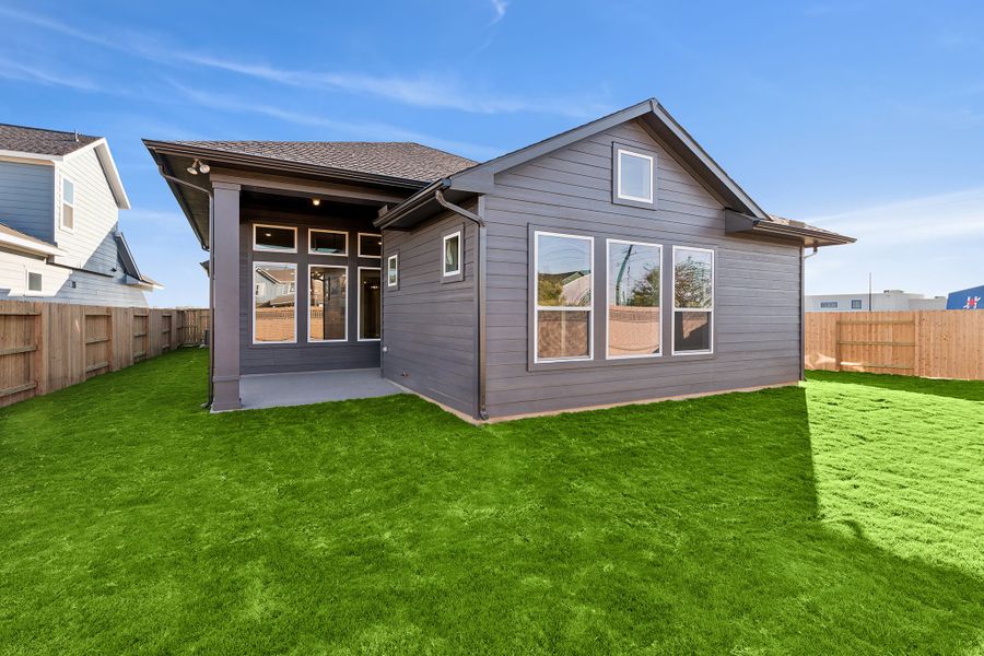 Exterior details and patio area of a home in Elyson 45', Katy (Image 3).