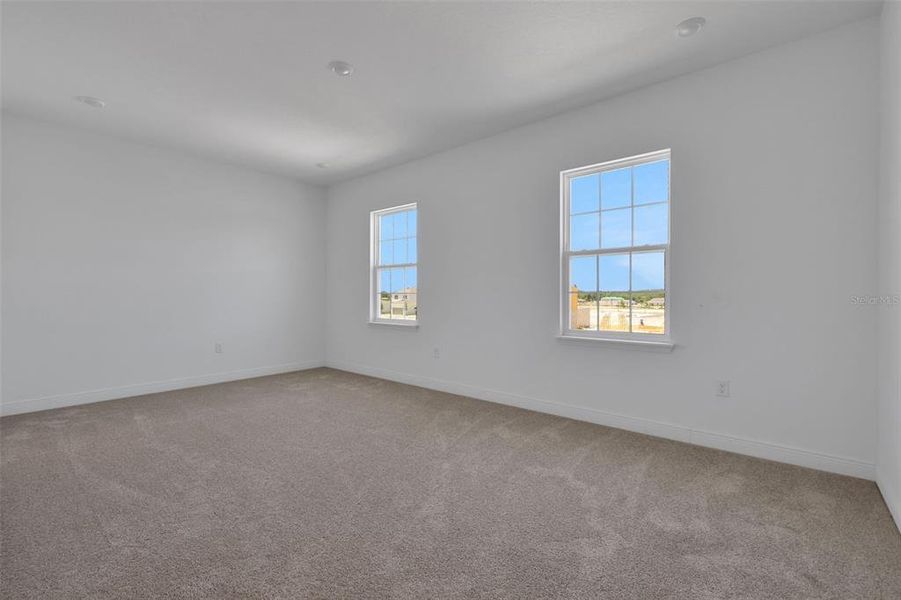 Spacious, unfurnished interior of a new home in Serenade at Ovation, Winter Garden (Image 29). Spacious, unfurnished interior of a new home in Serenade at Ovation, Winter Garden (Image 29).
