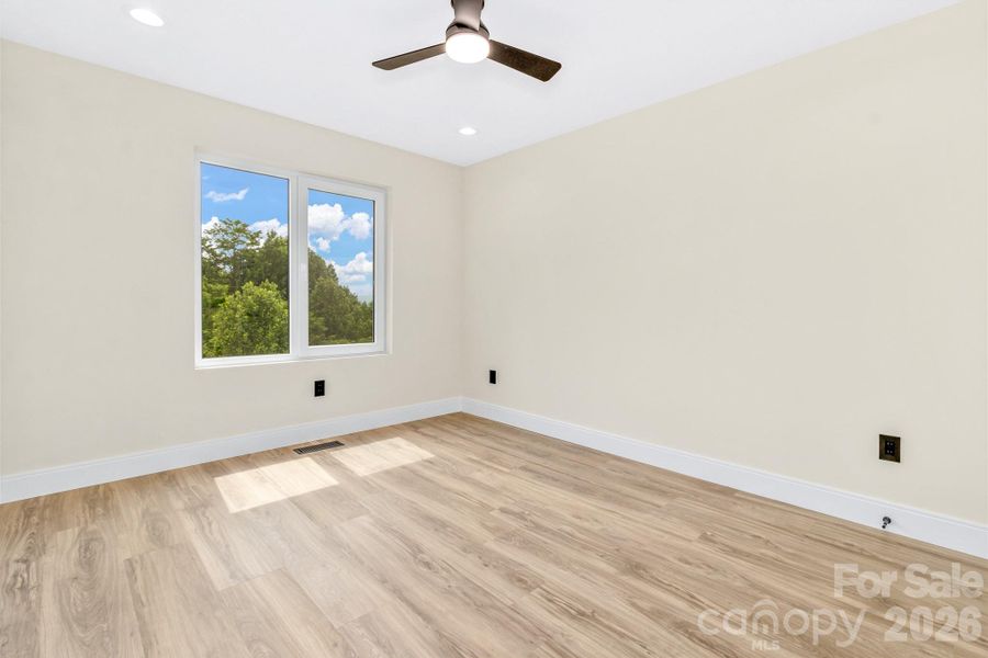 Spacious, unfurnished interior of a new home in , Hendersonville (Image 32).