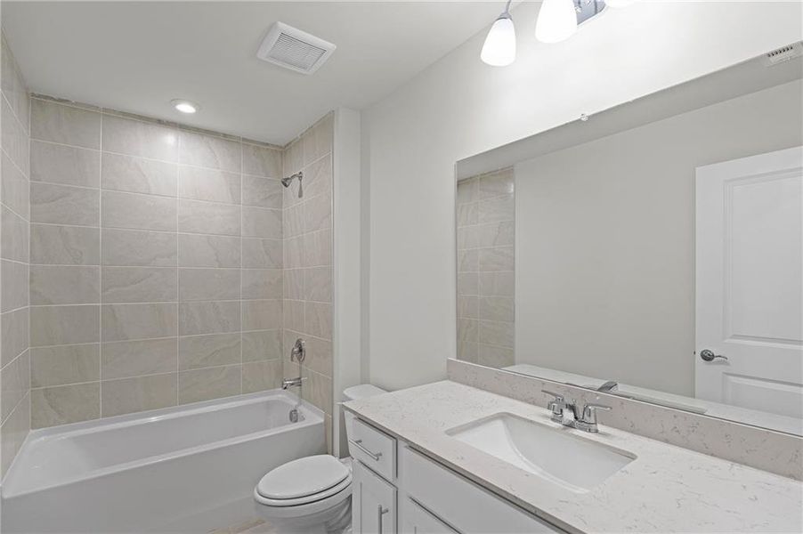 Furnished interior view inside a new home in Ansley Towns, Cumming (Image 8).