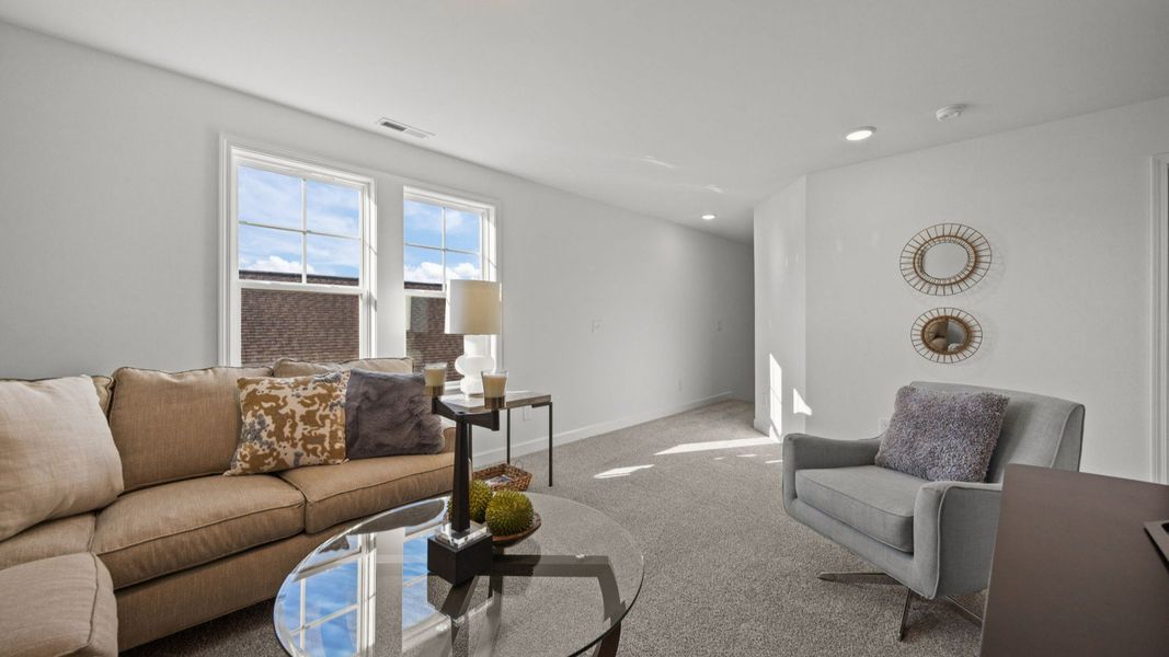 Representative furnished interior of a home built from the Victoria by Epcon Communities in Village at Maple Leaf Farm, King (Image 19).