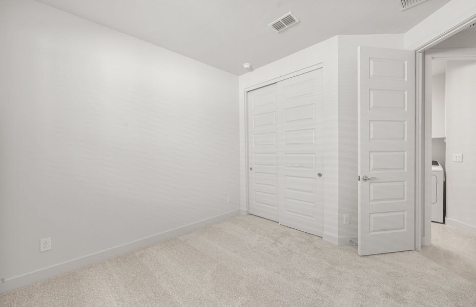 Spacious, unfurnished interior of a new home in Blossom Rock, Apache Junction (Image 15).