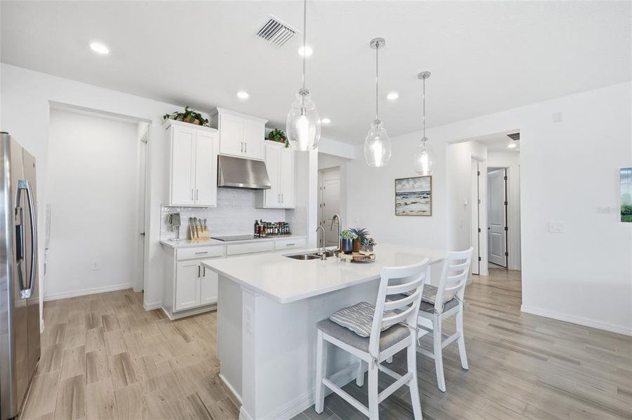 Furnished interior view inside a new home in Westview Community Group Page, Kissimmee (Image 16).