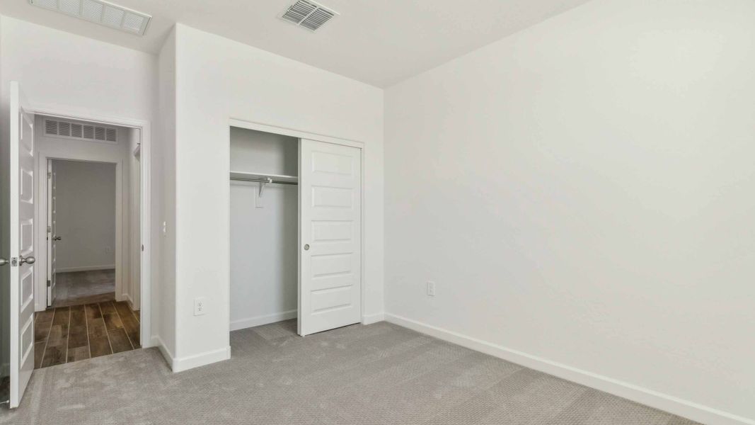 Spacious, unfurnished interior of a new home in Radiance at Superstition Vistas, Apache Junction (Image 24).