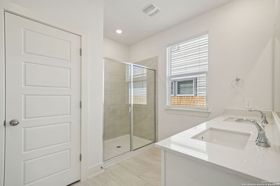 Furnished interior view inside a new home in Estancia Ranch - Premier Series, San Antonio (Image 11).