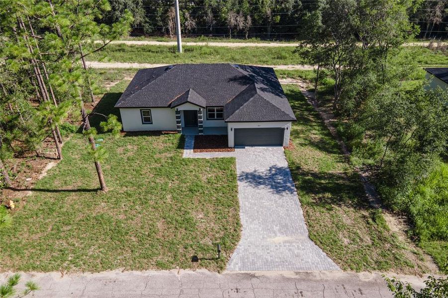 Front exterior of a new home in , Citrus Springs, FL, highlighting curb appeal (Image 23).