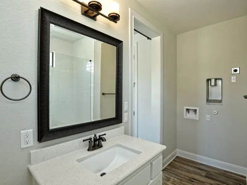 Representative furnished interior of a home built from the Casita by Giddens Homes in Whispering Wind, Bertram (Image 5).