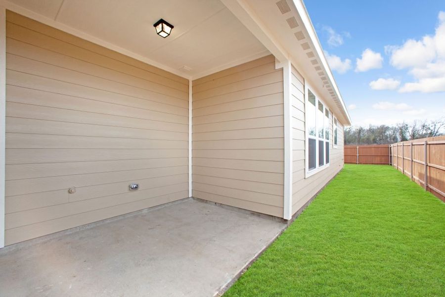 Representative exterior photo of a completed home built from the Wesley by Impression Homes in Heartland, Heartland, TX (Image 21). Representative exterior photo of a completed home built from the Wesley by Impression Homes in Heartland, Heartland, TX (Image 21).
