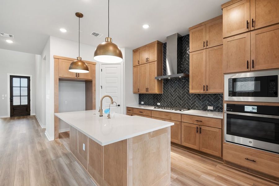 Furnished interior view inside a new home in Arbor Collection at Lariat, Liberty Hill (Image 13). Furnished interior view inside a new home in Arbor Collection at Lariat, Liberty Hill (Image 13).