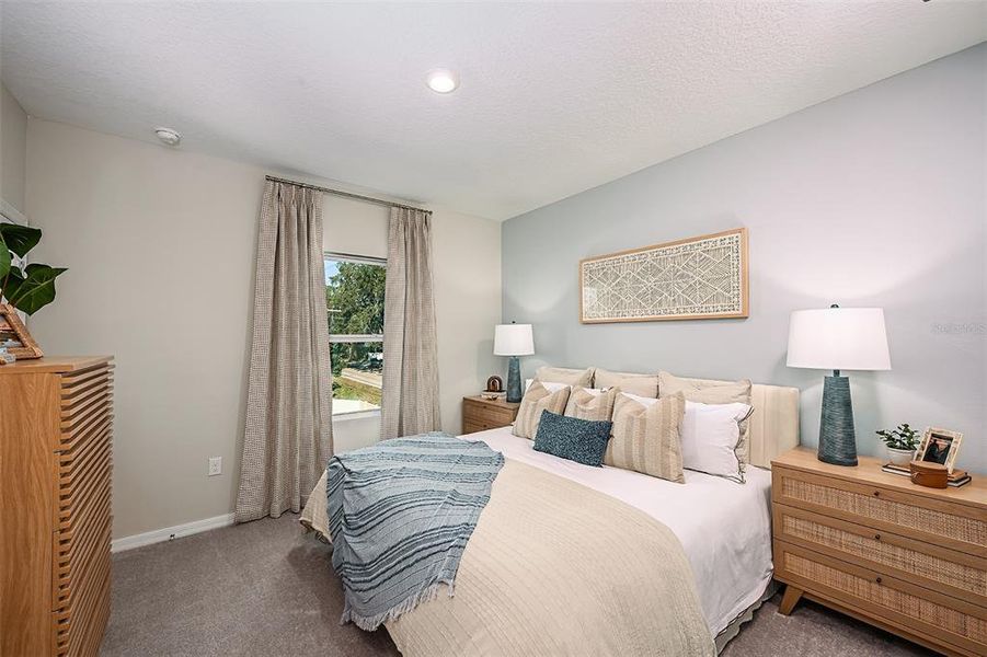 Furnished interior view inside a new home in Westview Community Group Page, Kissimmee (Image 8).