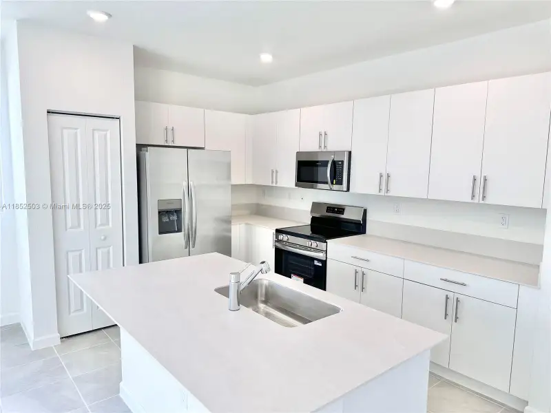 Furnished interior view inside a new home in , Florida City (Image 16).