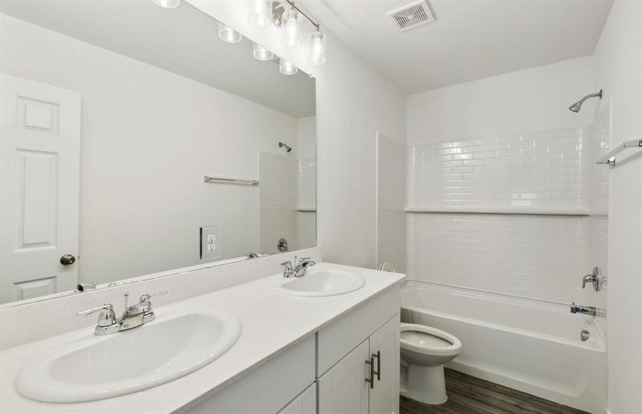 Upgraded secondary bathroom*real home pictured