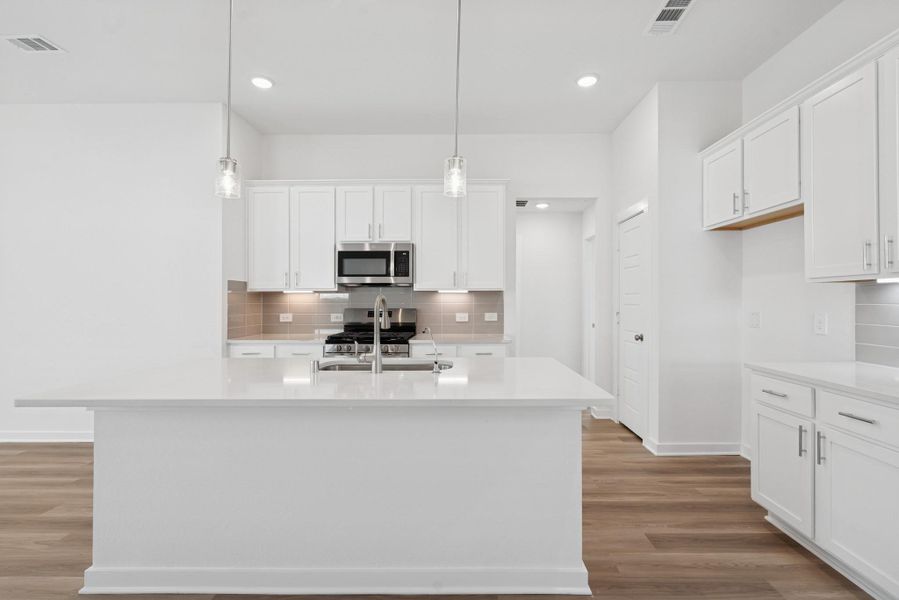 Furnished interior view inside a new home in Pinewood at Grand Texas, New Caney (Image 7).