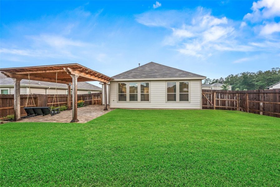 Exterior details and patio area of a home in Grace Landing, Willis (Image 16).