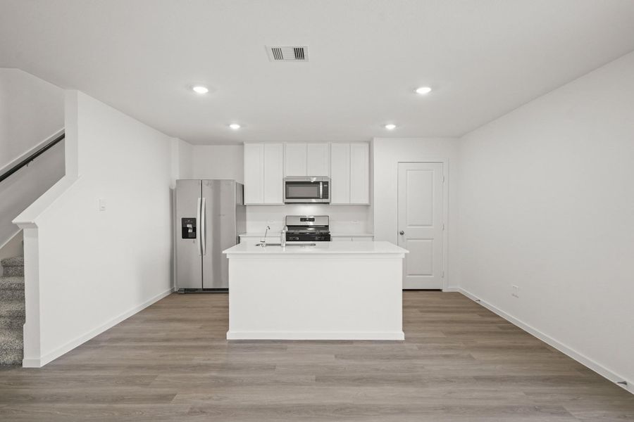 Furnished interior view inside a new home in The Canopies, Splendora (Image 5).