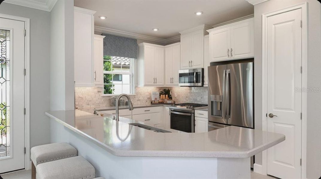 Furnished interior view inside a new home in Esplanade at Wellen Park, Englewood (Image 3).