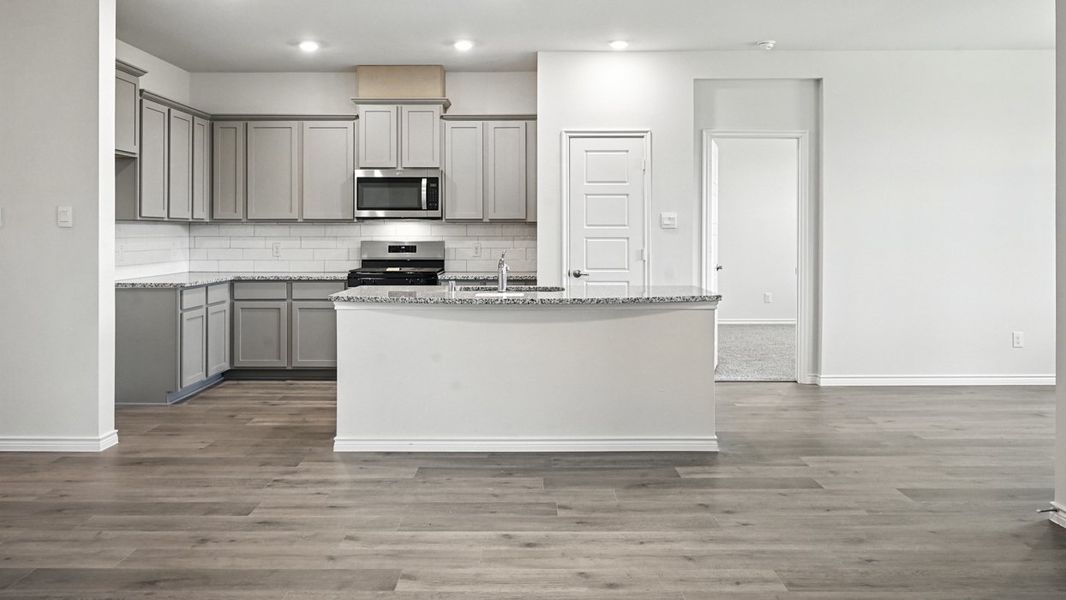 Representative furnished interior of a home built from the Rivington by D.R. Horton in Bel Air Village, Sherman (Image 6).
