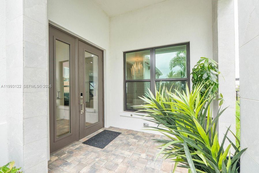 Exterior details and patio area of a home in Solana Bay at Avenir, Palm Beach Gardens (Image 27).