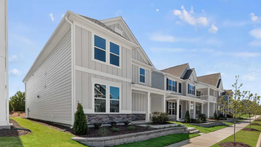 Front exterior of a new home in Madden West, Fuquay Varina, NC, highlighting curb appeal (Image 16).