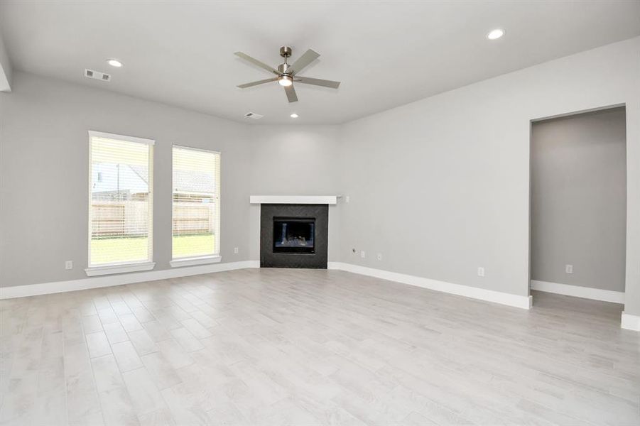 Discover another perspective of the spacious family room.