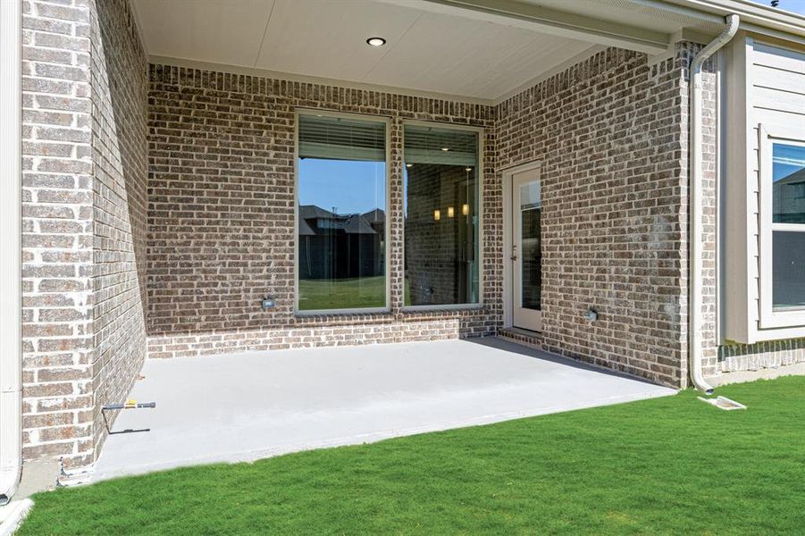 Exterior details and patio area of a home in Union Park Classic 60, Little Elm (Image 23). Exterior details and patio area of a home in Union Park Classic 60, Little Elm (Image 23).