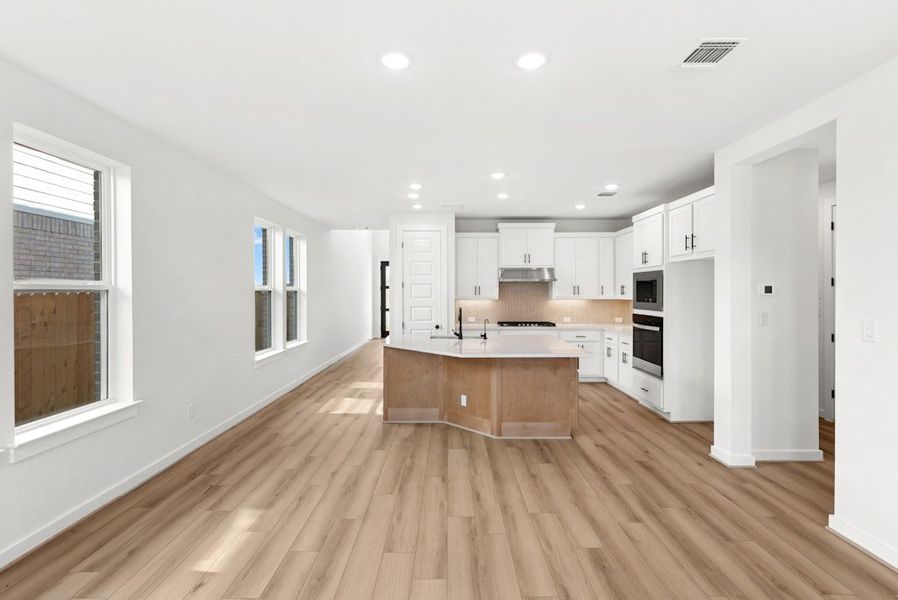 Furnished interior view inside a new home in University Heights, Round Rock (Image 11).