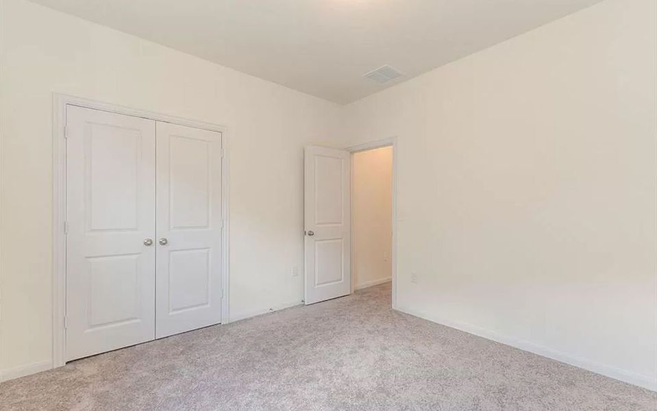 Spacious, unfurnished interior of a new home in Brooklands, Hutto (Image 18).