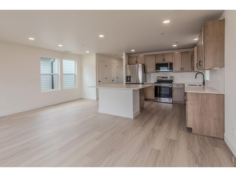 Furnished interior view inside a new home in Bloom Trailblazer Collection - Single Family Homes, Fort Collins (Image 6).