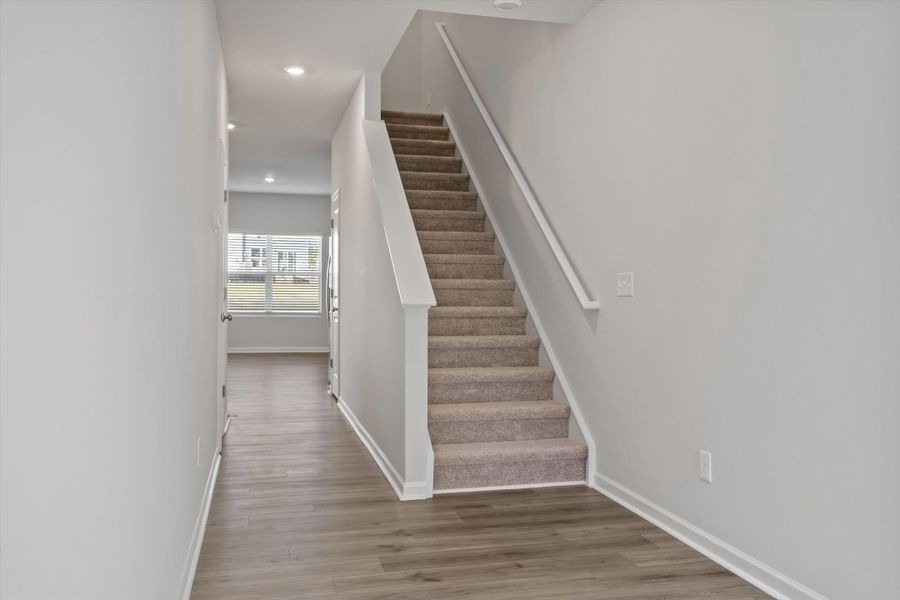 Spacious, unfurnished interior of a new home in West Main Townhomes, Sanford (Image 13).