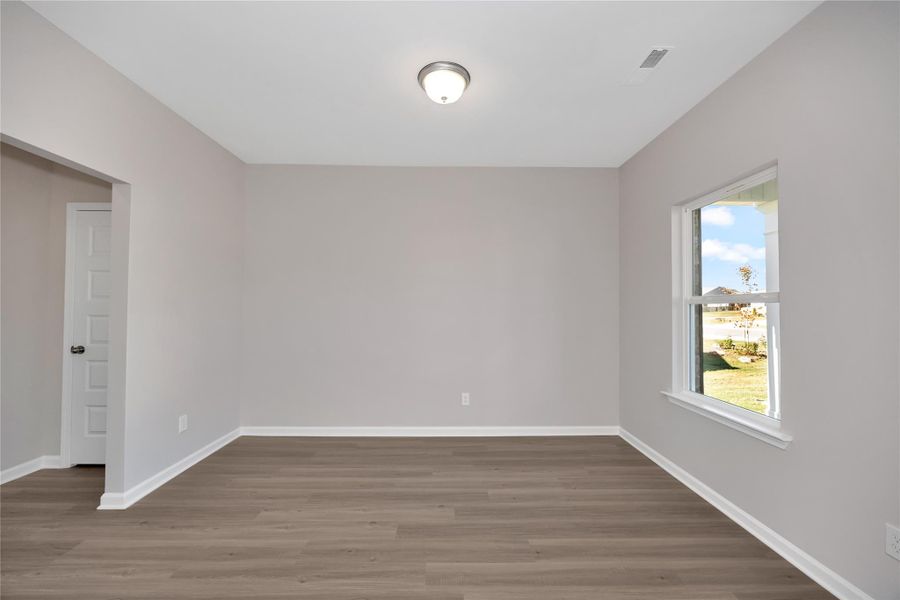 The Harrington- Foyer into Study (French doors not pictured). Sample image for illustration; upgrades, options, and colors may vary. The Harrington- Foyer into Study (French doors not pictured). Sample image for illustration; upgrades, options, and colors may vary.