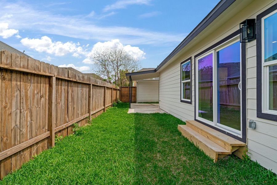 Exterior details and patio area of a home in , Houston (Image 24).