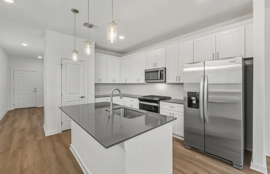 Furnished interior view inside a new home in Crosswinds, Kyle (Image 8).