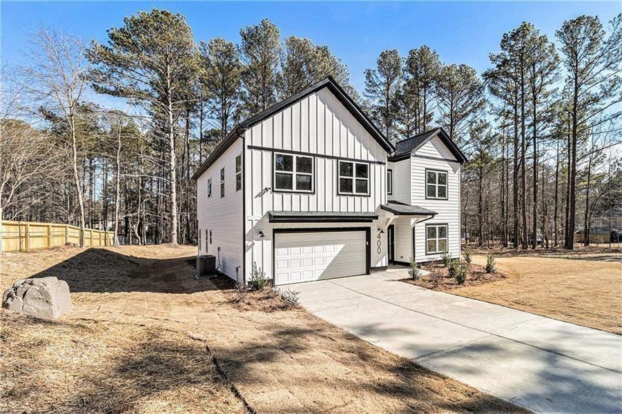 Front exterior of a new home in , Oxford, GA, highlighting curb appeal (Image 23).