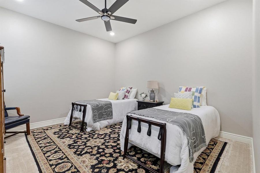 Spacious Guest Bedroom featuring a Private En-suite Bath, Designer Thibaut Wallpaper, and Plantation Shutters.