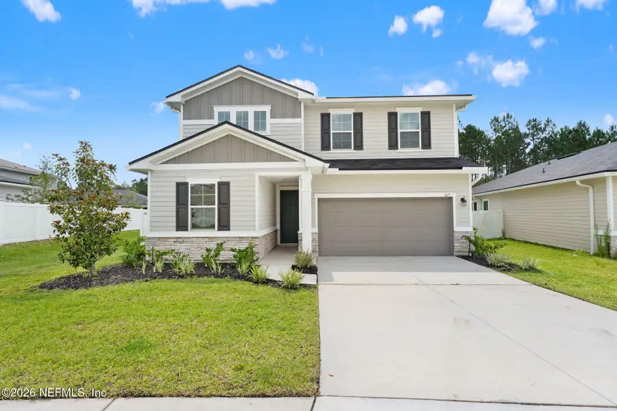 Front exterior of a new home in , Orange Park, FL, highlighting curb appeal (Image 2). Front exterior of a new home in , Orange Park, FL, highlighting curb appeal (Image 2).