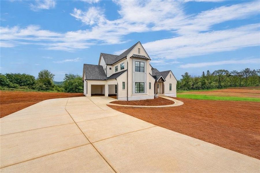 Front exterior of a new home in , Rydal, GA, highlighting curb appeal (Image 1). Front exterior of a new home in , Rydal, GA, highlighting curb appeal (Image 1).