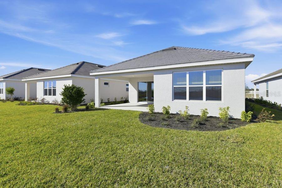 Exterior details and patio area of a home in Coasterra Community Group Page, Palmetto (Image 3).