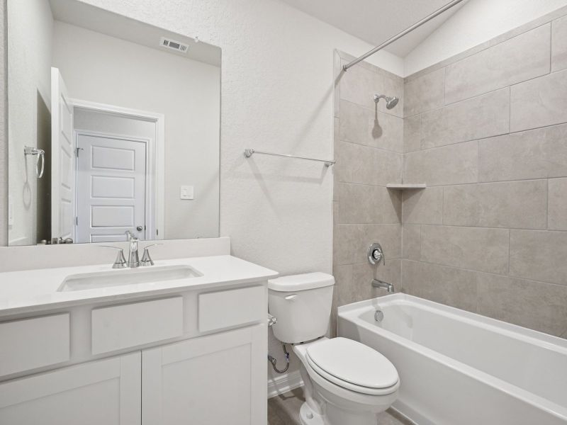 Guest bathroom in the Briscoe floorplan at a Meritage Homes community. Guest bathroom in the Briscoe floorplan at a Meritage Homes community.