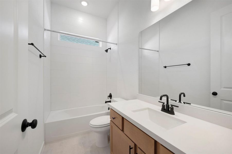 Furnished interior view inside a new home in Heritage, Dripping Springs (Image 11).