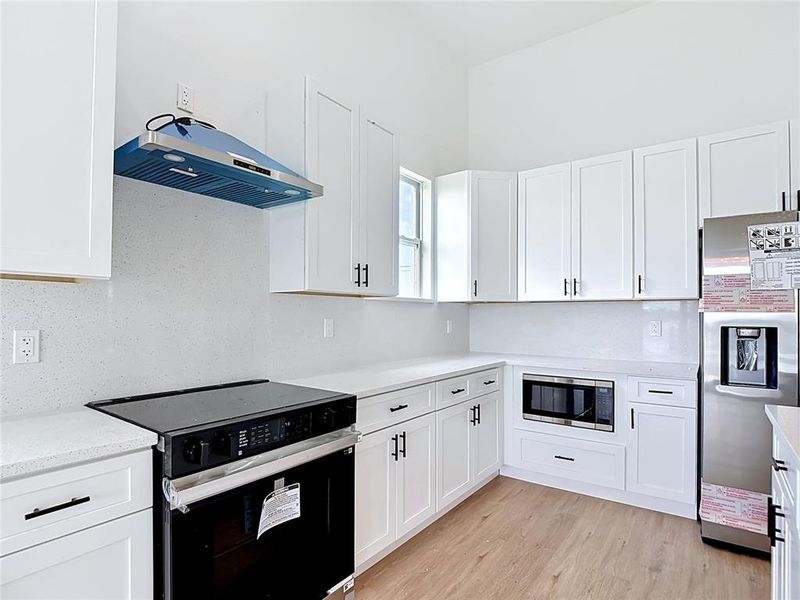 Furnished interior view inside a new home in , Port Charlotte (Image 9).