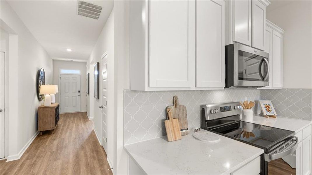 Furnished interior view inside a new home in The Preserve at Agricultural Village, Perry (Image 26).