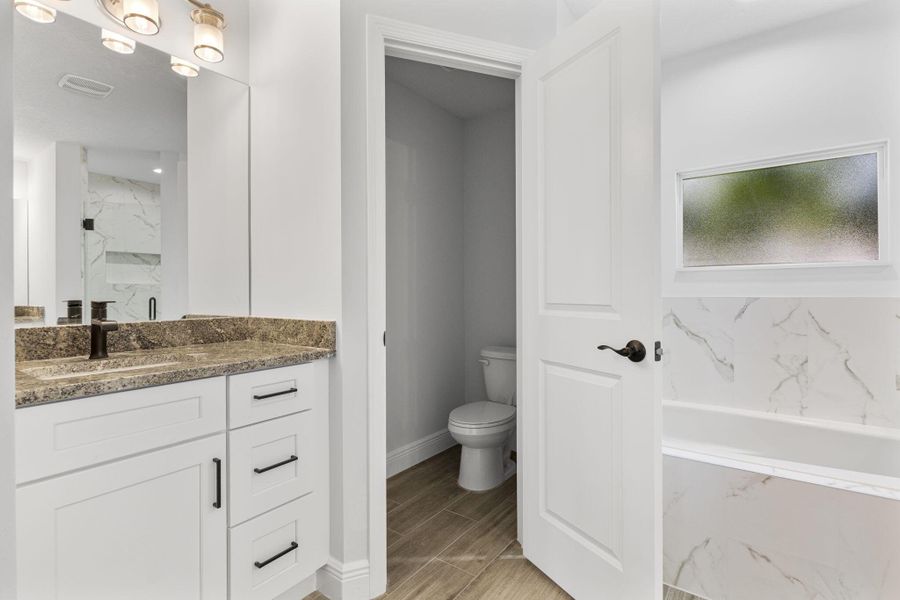 Furnished interior view inside a new home in , Port St. Lucie (Image 8).